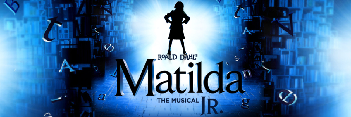 West end logo of Matilda The Musical, with a silhouette of a small girl, hands on hips, with the words 'Roald Dalh's Matilda The Musical JR.' in black, backlit by a strong white light. Letters and books surround the image, in various shades of blue.